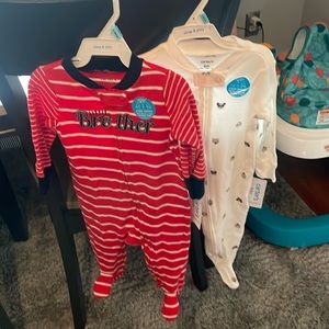 2 NWT carters sleep n plays